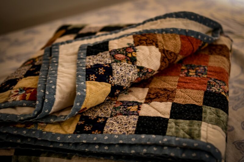 Quilt Tæppe: Historie, Anvendelser og Betydning